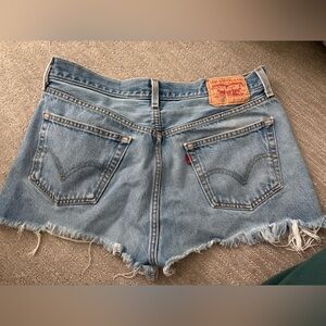 Vintage Levi's Women's Light Blue Denim Cutoff Shorts with Frayed Edge